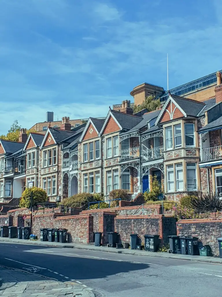 Charming Victorian terraced houses under a clear blue sky in Bristol, England.